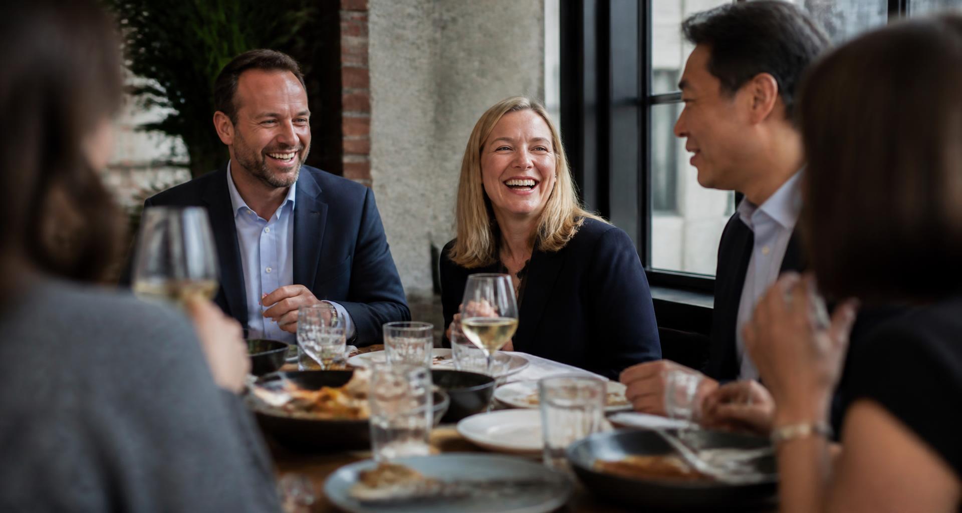 KBX members eating together around a table